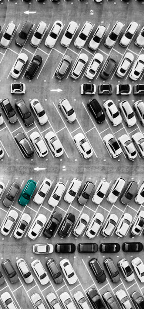Aerial carpark ODA blue portrait